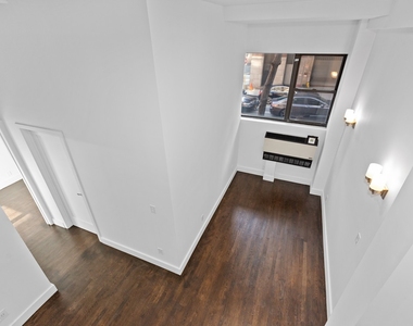 207 East 37th Street - Photo Thumbnail 0