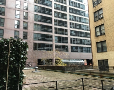 412 E 55th Street  - Photo Thumbnail 1