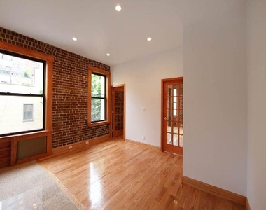 324 East 52nd St - Photo Thumbnail 2