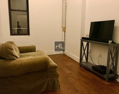 165 West 127 Street - Photo Thumbnail 4