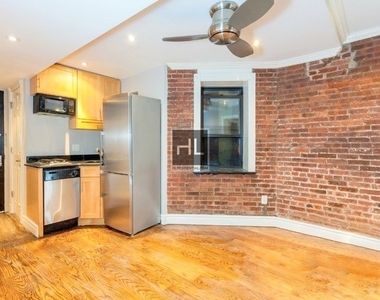 209 East 25th Street, Unit C - Photo Thumbnail 0