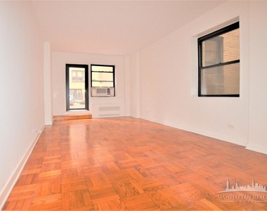 412 E 55th St - Photo Thumbnail 0