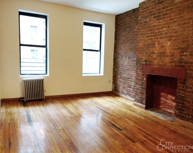 327 E 54th St - Photo Thumbnail 0