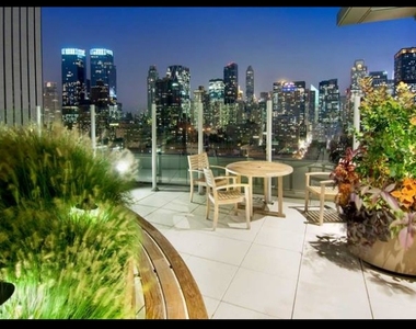 515 W 52nd St - Photo Thumbnail 9