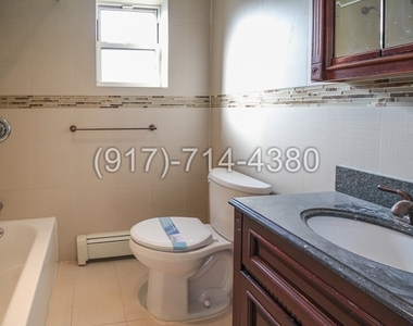 562 Quincy St - Photo Thumbnail 7