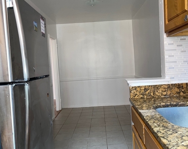66th Avenue, Rego Park, NY 11374 - Photo Thumbnail 4