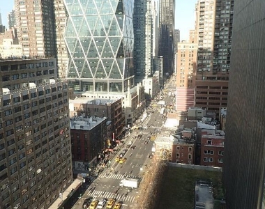 W 54th St. - Photo Thumbnail 7