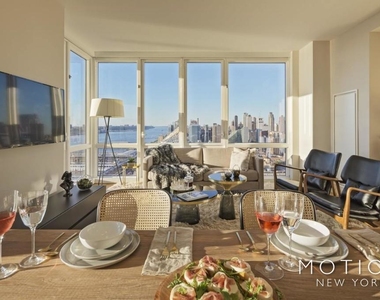 605 West 42nd Street, - Photo Thumbnail 1