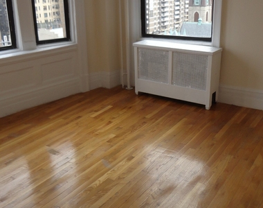 West 97 St - Photo Thumbnail 1