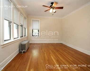 4725 N Leavitt Apt 1 - Photo Thumbnail 1