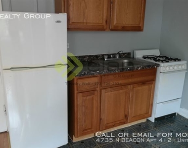 4735 N Beacon Apt 412 - Photo Thumbnail 1