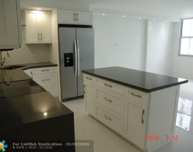 6039 Collins Ave - Photo Thumbnail 7