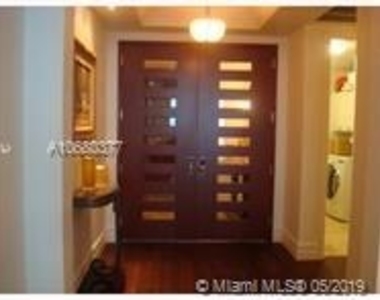 16047 Collins Ave - Photo Thumbnail 1