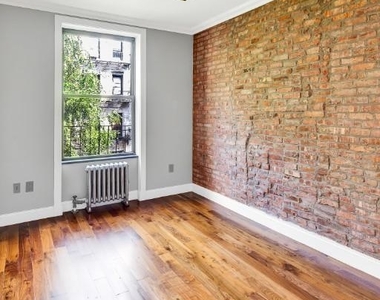 329 E 58th St. - Photo Thumbnail 3