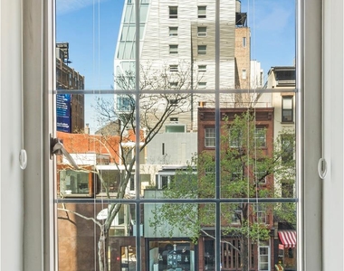 465 West 23rd St - Photo Thumbnail 1