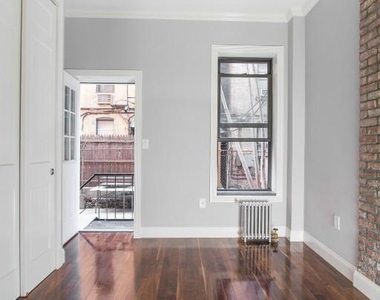 434 W 52nd St. - Photo Thumbnail 3