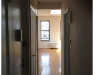 214 East 11th Street - Photo Thumbnail 3