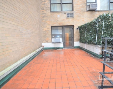 412 E 55th St - Photo Thumbnail 4