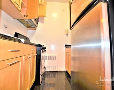 412 E 55th St - Photo Thumbnail 1