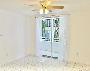 9156 Collins Ave - Photo Thumbnail 2