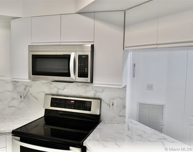 9156 Collins Ave - Photo Thumbnail 8