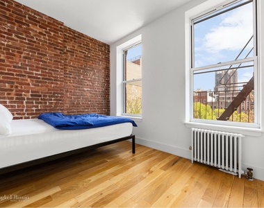 219 Mott St - Photo Thumbnail 2