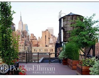 308 West 30th St - Photo Thumbnail 6