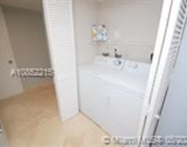 6917 Collins Ave - Photo Thumbnail 3