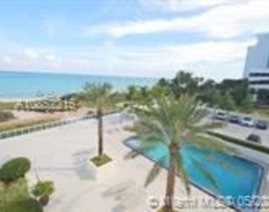 6917 Collins Ave - Photo Thumbnail 8