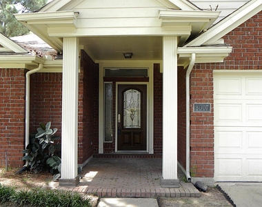 8007 Hidden Oaks Lane - Photo Thumbnail 1