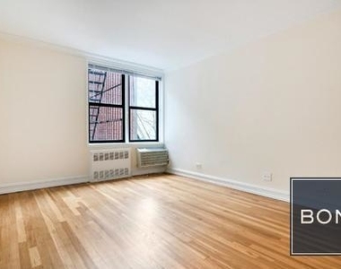 305 West 13th Street - Photo Thumbnail 1