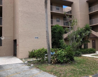 9440 Live Oak Pl Apt 406 - Photo Thumbnail 0