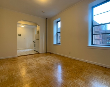 421 W 38th St - Photo Thumbnail 1