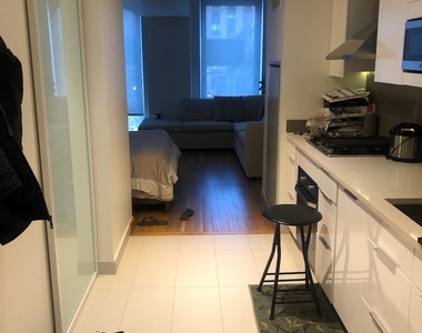 431 West 37th Street - Photo Thumbnail 0