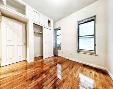 214 East 10th Street - Photo Thumbnail 0