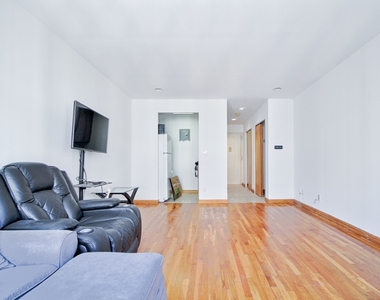 370 West 30th Street - Photo Thumbnail 1