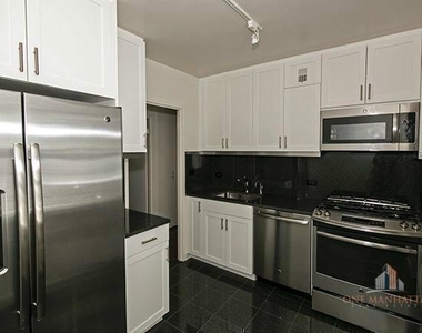 E 56 St. - Photo Thumbnail 1