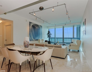 6899 Collins Ave - Photo Thumbnail 2