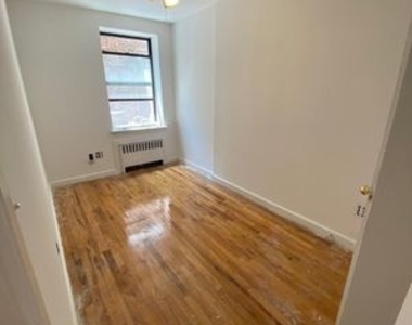 408 West 49th Street - Photo Thumbnail 0