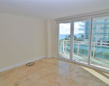 6917 Collins Ave - Photo Thumbnail 4