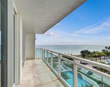 6917 Collins Ave - Photo Thumbnail 1