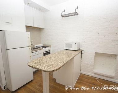 128 East 83rd Street - Photo Thumbnail 0