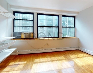 West 53rd St, Reduced Fee - Photo Thumbnail 0