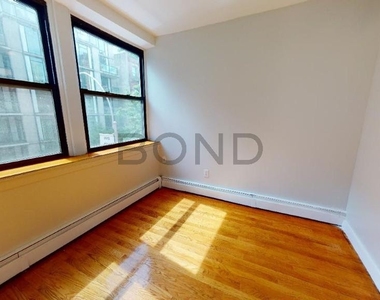 West 53rd St, Reduced Fee - Photo Thumbnail 1