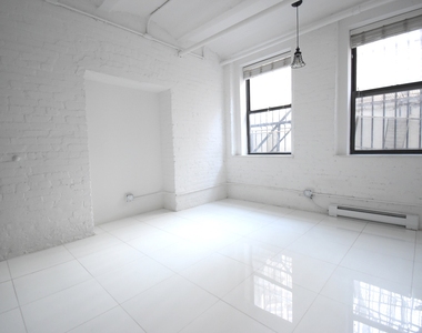 309 W 111th St - Photo Thumbnail 4