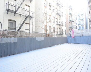 309 W 111th St - Photo Thumbnail 2