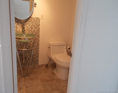 6450 Collins Ave - Photo Thumbnail 8