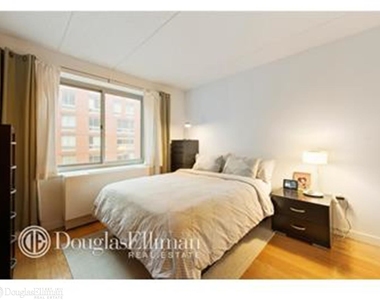 555 West 23rd St - Photo Thumbnail 2