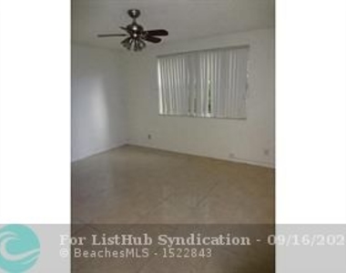 8781 Wiles Rd - Photo Thumbnail 4