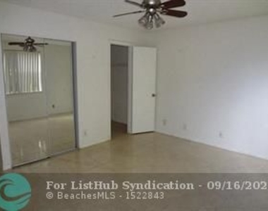 8781 Wiles Rd - Photo Thumbnail 5